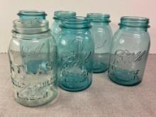 Group of Aqua Colored Mason Jars