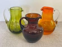Group of Three Hand Blown Glass Small Pitcher/Creamer