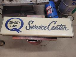 Quality Care Service Center Sign