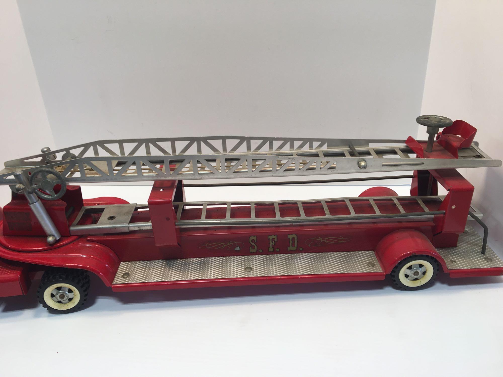 Vintage STRUCTO pressed metal SFD ladder tractor/trailer fire truck