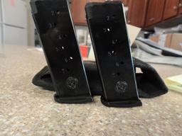 2 RUGER 7 RD 9 MM MAGAZINES WITH POUCH