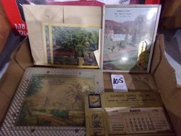 BOX OF ADVERTISING CALANDERS AND THERMOMETERS 1950S