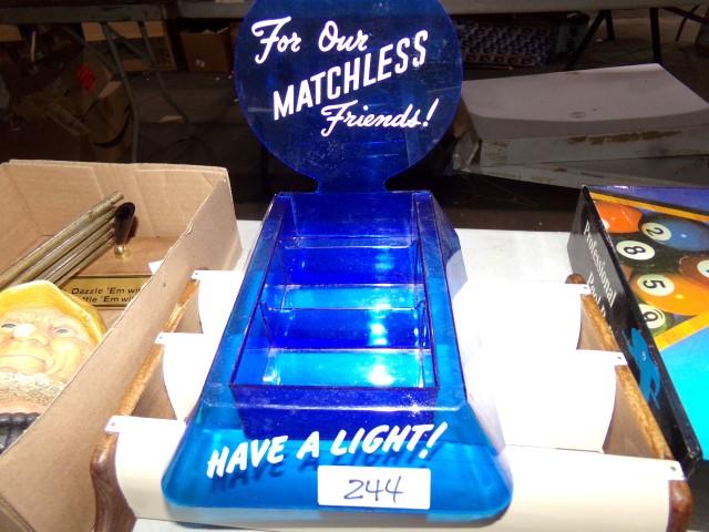 BLUE PLASTIC MATCHES DISPLAY AND SMALL SHELF
