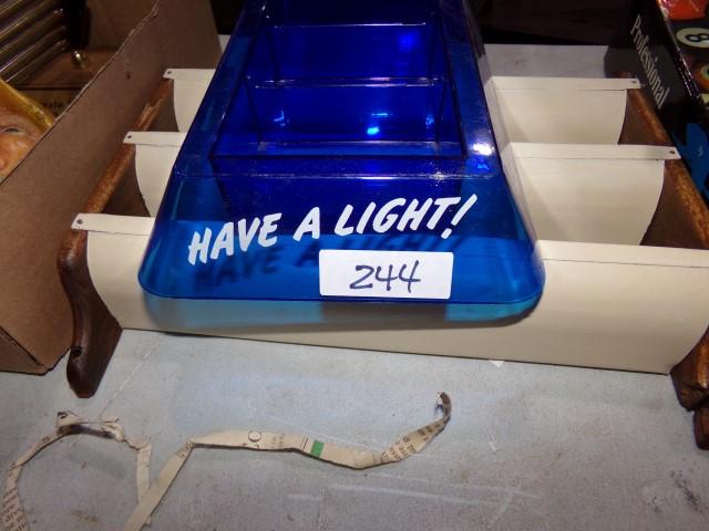 BLUE PLASTIC MATCHES DISPLAY AND SMALL SHELF