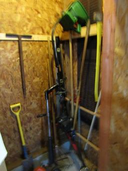 LARGE CABINET CONTENTS WITH AXES CLAMPS SAWS WEED EATERS AND GARDEN EQUIPME