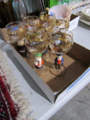 7 WEST GERMAN CORDIALS WITH GOLD GILD AND FIGURINE STEMS