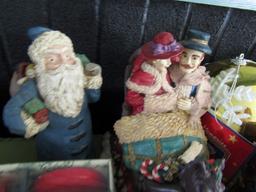 COLLECTION OF CHRISTMAS DECORATIVES INCLUDING SANTAS NUT CRACKERS AND MORE