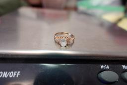 14 KT YELLOW GOLD RING 1 CLEAR STONE 12 SMALL DIAMONDS SIZE 4.5 .8 DWT