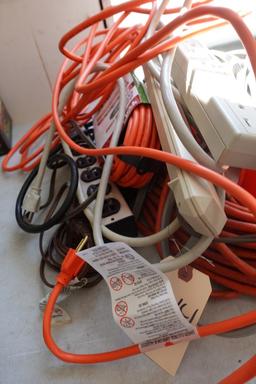 LOT OF EXTENSION CORDS AND SURGE PROTECTORS