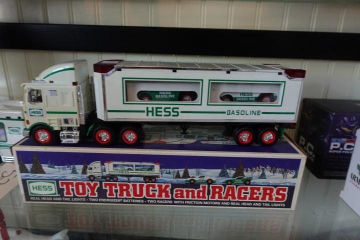 COLLECTION OF HESS TRUCKS AND ARMORED CARS ETC