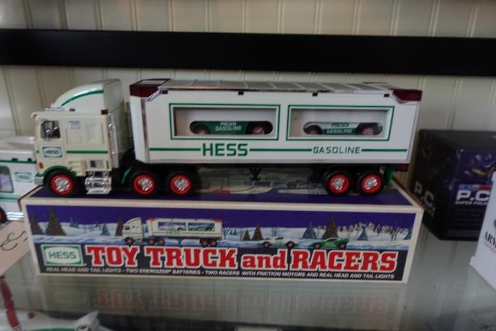 COLLECTION OF HESS TRUCKS AND ARMORED CARS ETC