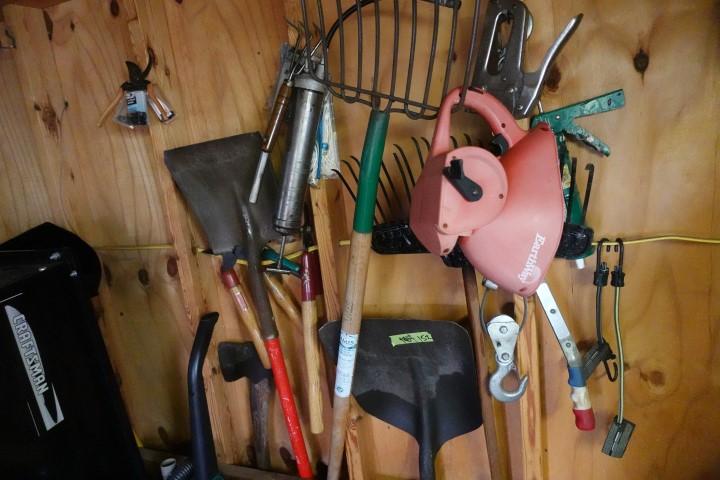 YARD TOOL LOT INCLUDING SHOVELS RAKES TRIMMERS AXE COME ALONGS AND MORE