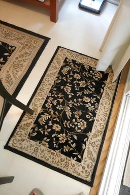 TWO PERSIAN STYLE BLACK RUGS APPROX 5 X 7 AND 5 X 4