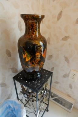 WROUGHT IRON PLANT STAND WITH FLORAL DESIGN AND ORIENTAL STYLE VASE