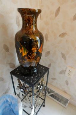 WROUGHT IRON PLANT STAND WITH FLORAL DESIGN AND ORIENTAL STYLE VASE