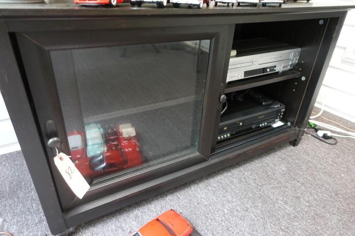 BLACK 2 DOOR ENTERTAINMENT CENTER WITH GLASS SLIDING DOORS 24 X 19 WITH 2 D