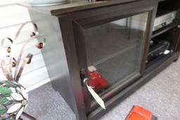 BLACK 2 DOOR ENTERTAINMENT CENTER WITH GLASS SLIDING DOORS 24 X 19 WITH 2 D