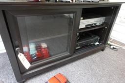 BLACK 2 DOOR ENTERTAINMENT CENTER WITH GLASS SLIDING DOORS 24 X 19 WITH 2 D