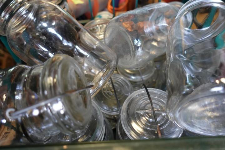 MILK CRATE FULL OF MISC TYPES AND SIZES CANNING JARS