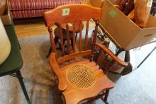 ANTIQUE ROCKER WITH BASKET WEAVE SEAT AND ANTIQUE PIANO STOOL WITH SWIVEL T