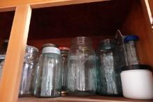 CABINET LOT INCLUDING CANNING JARS SOME VINTAGE BALL JARS