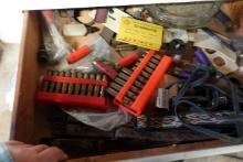 WOODEN CABINET WITH CONTENTS INCLUDING IGLOO COOLER MISC AMMO AND LINENS
