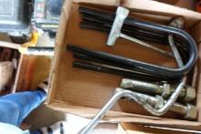 BOX WITH LARGE U BOLTS CHAIN SAW TOOL AND RATCHET WRENCH