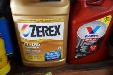SHELF LOT INCLUDING GALLONS OF LUBRICANTS ANTIFREEZE FUEL CANS PET CARRIERS