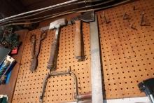 WALL LOT INCLUDING HATCHETS SPLITTING MAULS TIN SNIPS LEVELS AND GARDEN SUP