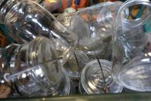 MILK CRATE FULL OF MISC TYPES AND SIZES CANNING JARS