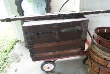 LOT OF BASKETS STEAMER TRUNK RADIO FLYER WAGON 5 PANEL WOODEN DOOR AND ANTI