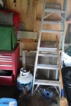RIGHT HAND SIDE OF BARN INCLUDING HORSE TACK STRAP HINGES FOLDING CHAIR BEL