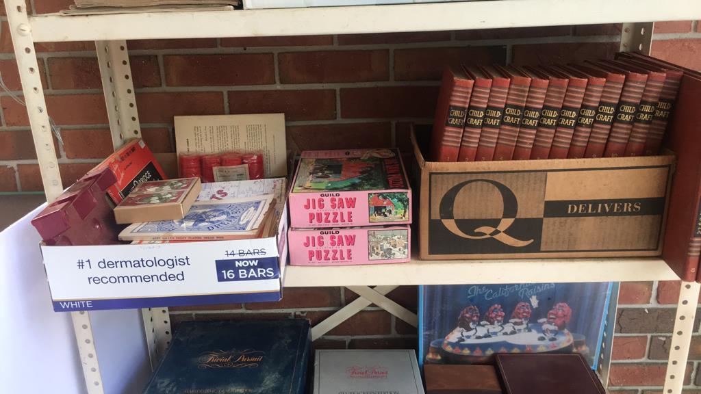 Shelf of Assorted Books, Magazines, Board Games,