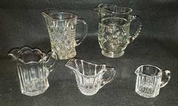 (3) Creamers, (2) Small Pitchers