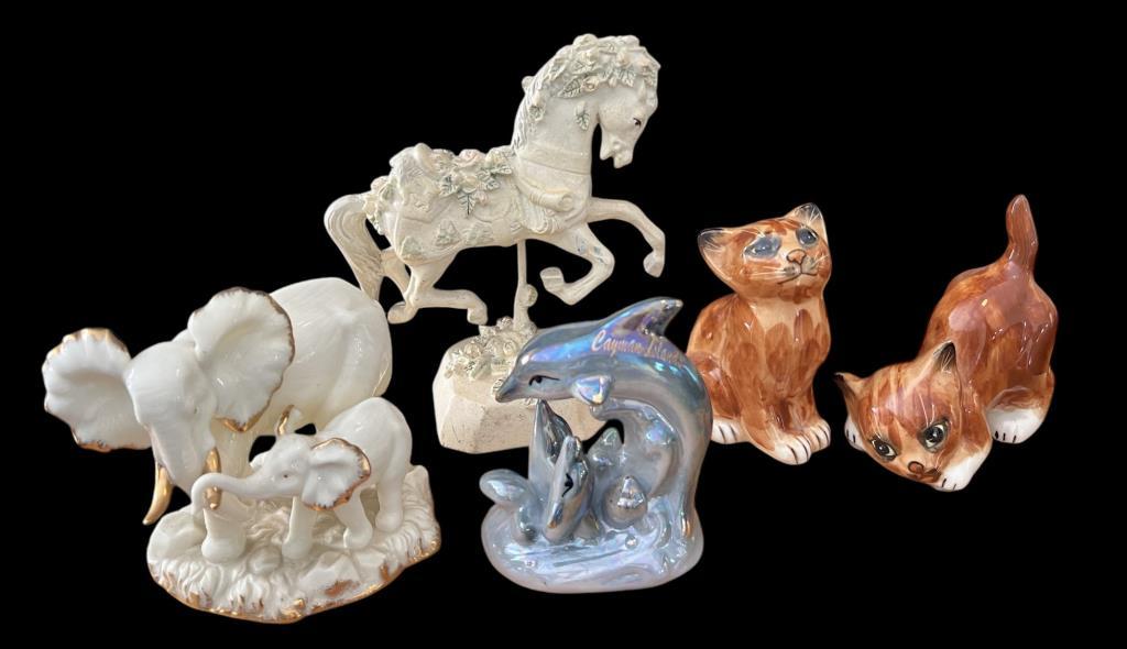 Assorted Figurines, Including Mann