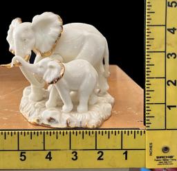Assorted Figurines, Including Mann