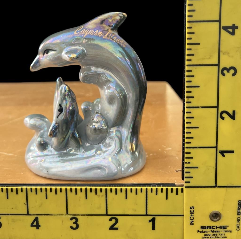 Assorted Figurines, Including Mann