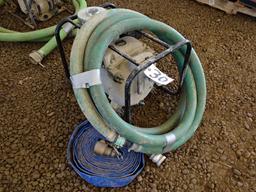 HONDA 2" Gas Powered Trash Pump and Hose. In good condition.