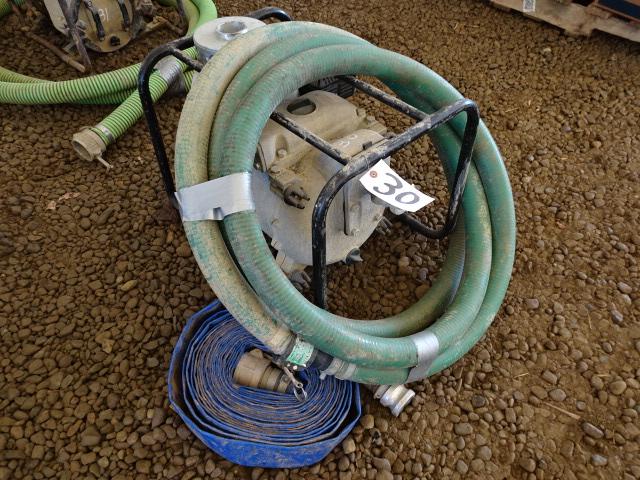 HONDA 2" Gas Powered Trash Pump and Hose. In good condition.