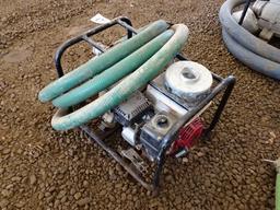 HONDA 2" Gas Powered Trash Pump and Hose. In good condition.