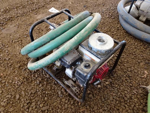 HONDA 2" Gas Powered Trash Pump and Hose. In good condition.