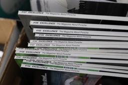 One box of Excellence automotive magazines