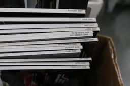 One box of Excellence automotive magazines