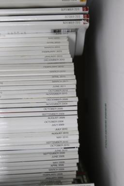 One box of Porsche Panorama and Excellence automotive magazines