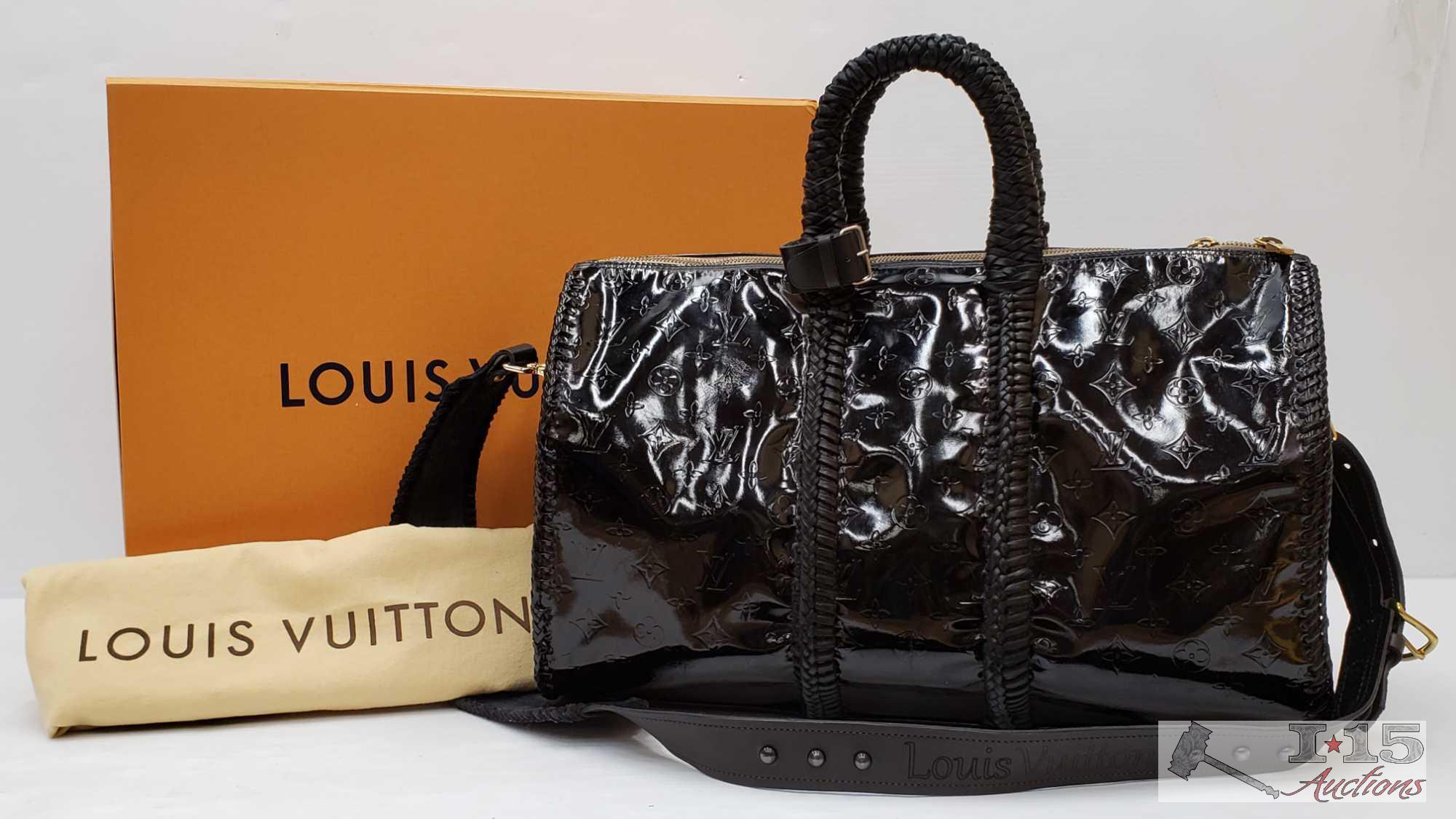 At Auction: Louis Vuitton, LOUIS VUITTON KEEPALL BANDOULIERE