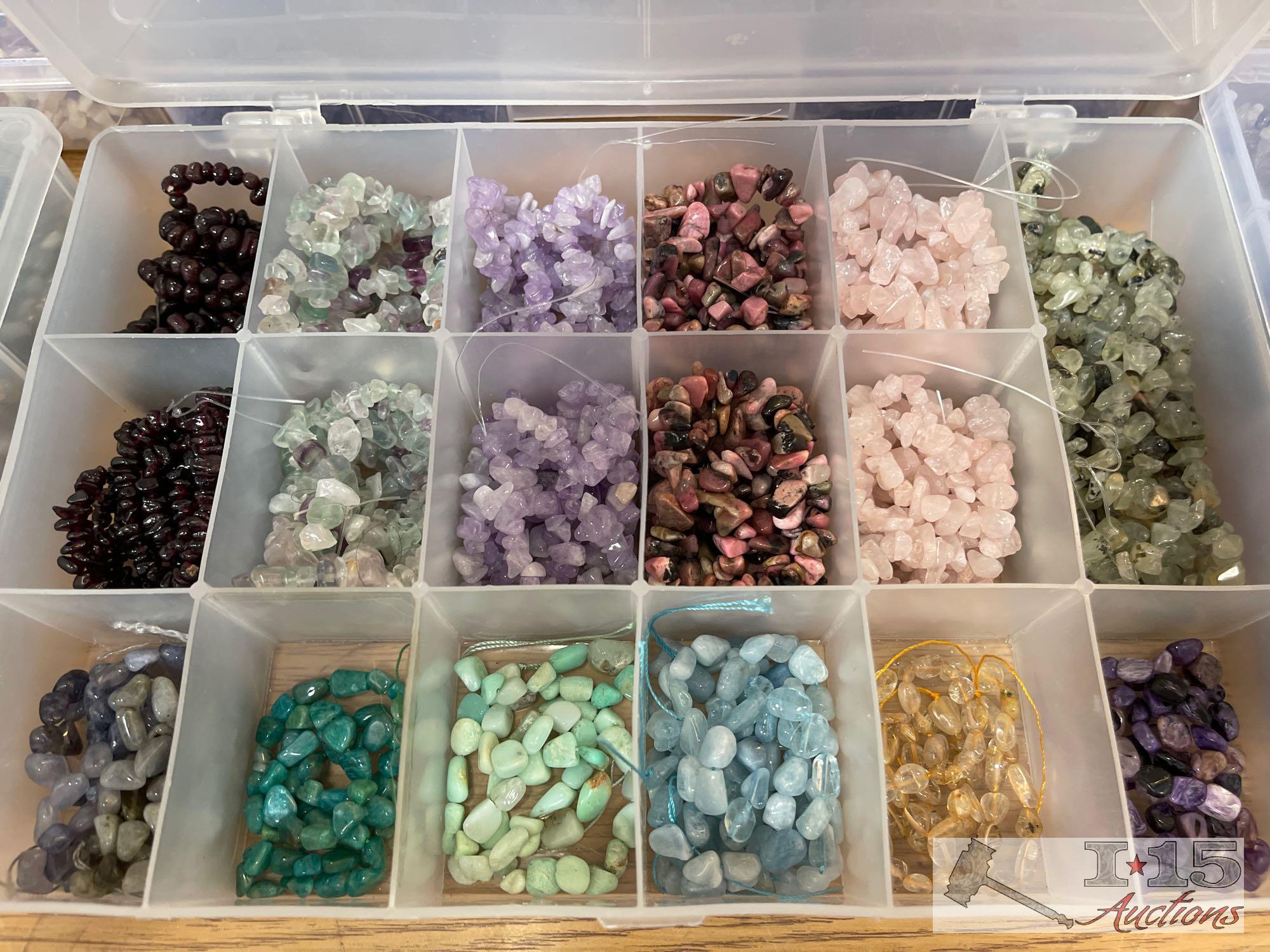 12 Organizers Full of Stringed Stones of Various Colors
