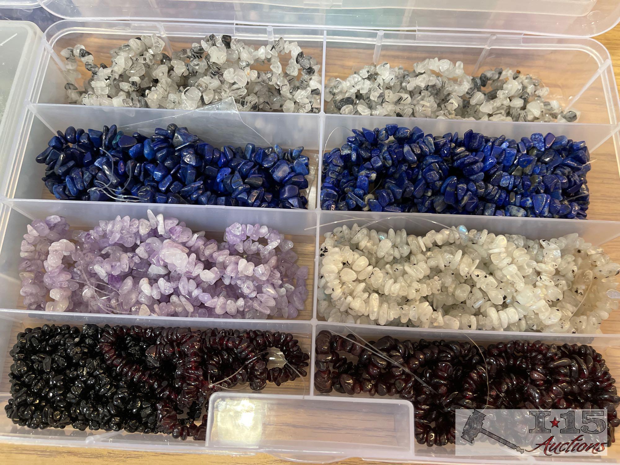 12 Organizers Full of Stringed Stones of Various Colors