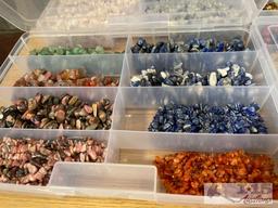 12 Organizers Full of Stringed Stones of Various Colors