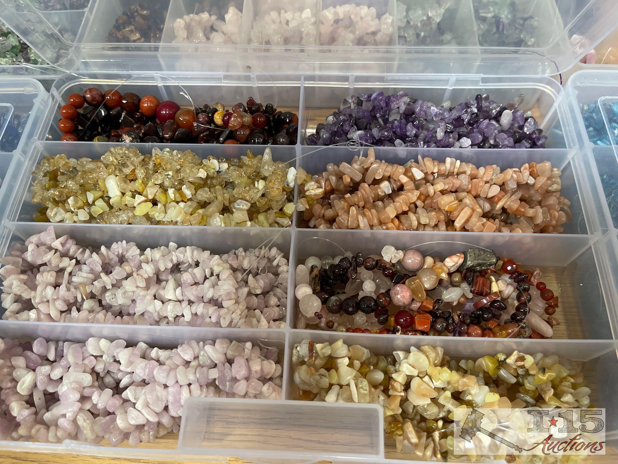 12 Organizers Full of Stringed Stones of Various Colors