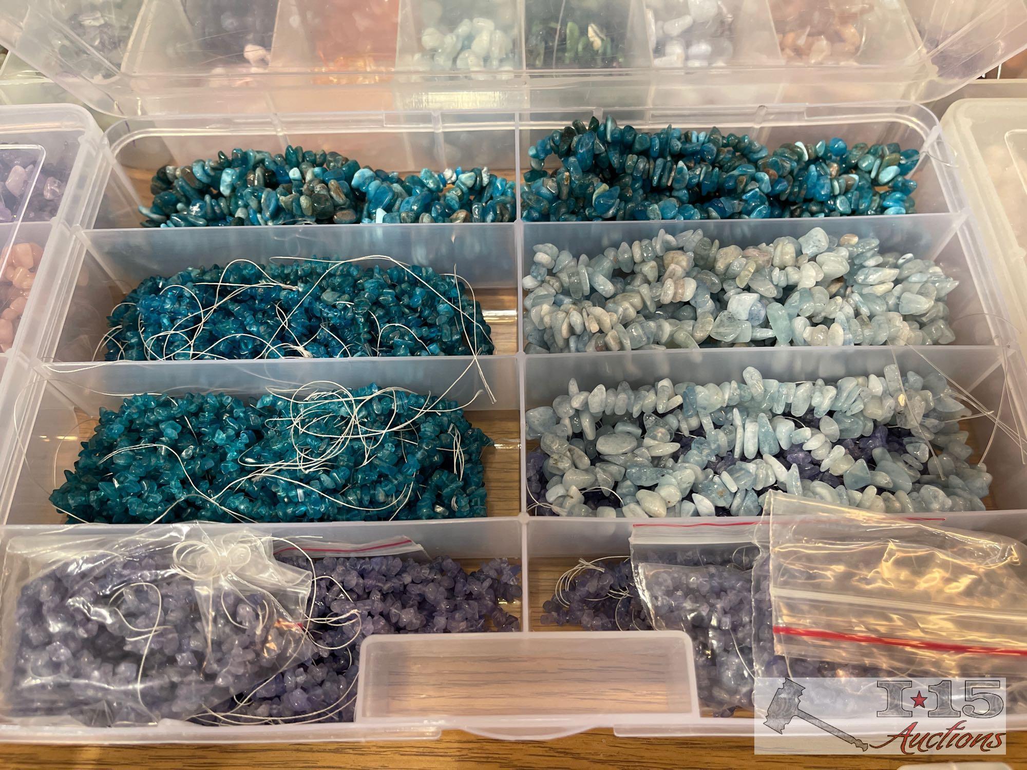 12 Organizers Full of Stringed Stones of Various Colors